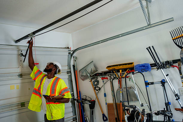 Professional Garage Door Spring Repair technician working in Bessemer, MI